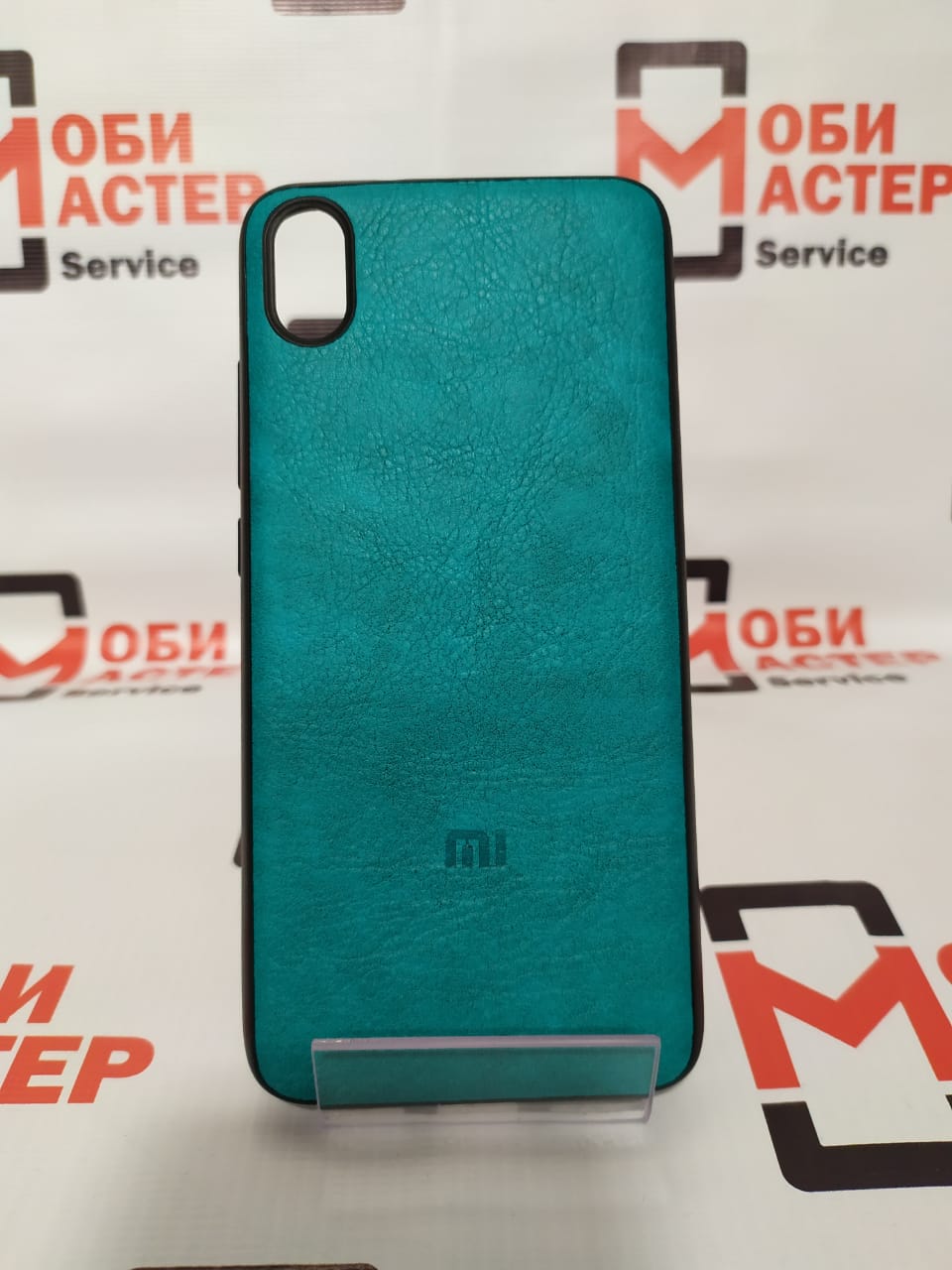 Чехол Xiaomi Redmi 7A (кожа/логотип/бирюза)